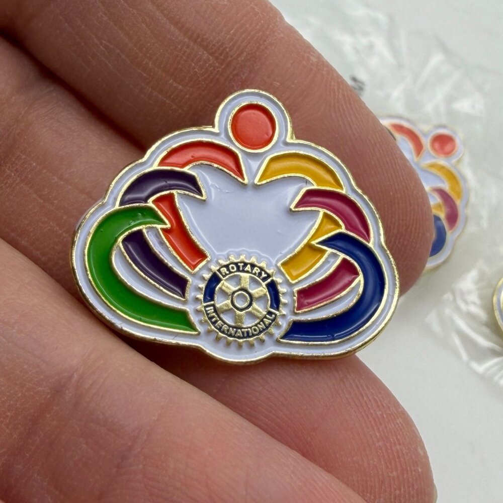 Rotary International pin Reach within to embrace humanity hat lapel pin back lot
